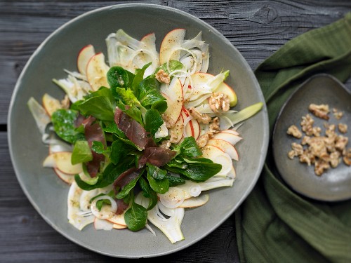 Apple and fennel salad with walnuts and venison ham