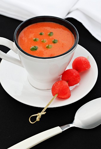 Watermelon gazpacho with basil pesto being made