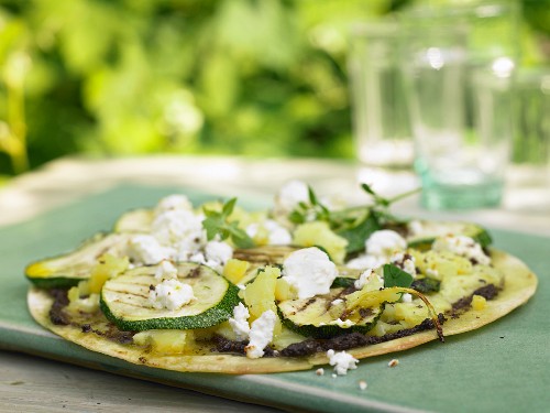 Grilled tortillas with vegetables and feta