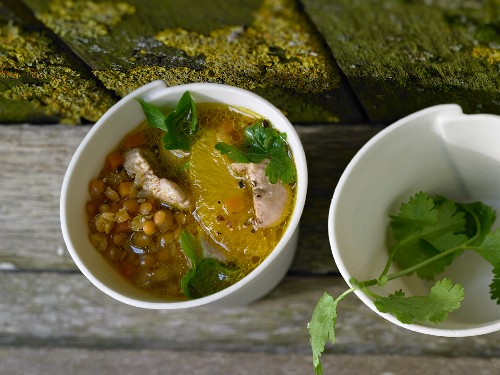 Red lentil soup with oranges and chicken breast