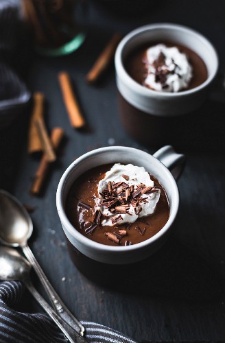 Dairy-free champurrado, almond milk with masa harina and coconut whipped cream