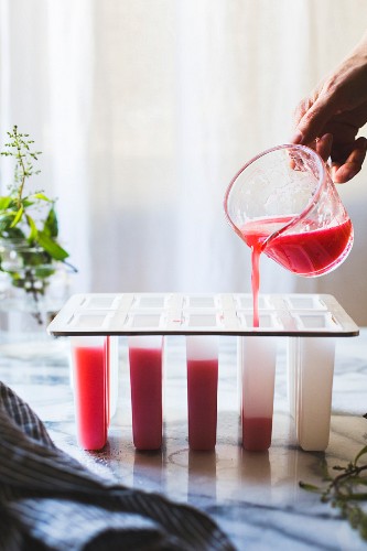 The recipe mixture for raspberry lemon verbena popsicles