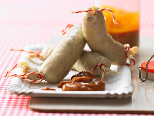 Zander-Weisswürstchen mit Curry-Orangen-Ketchup