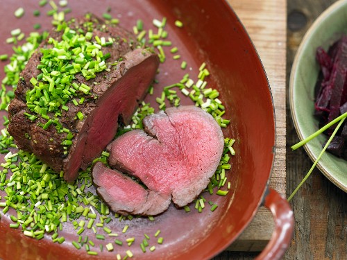 A herb and spice-crusted filet of beef