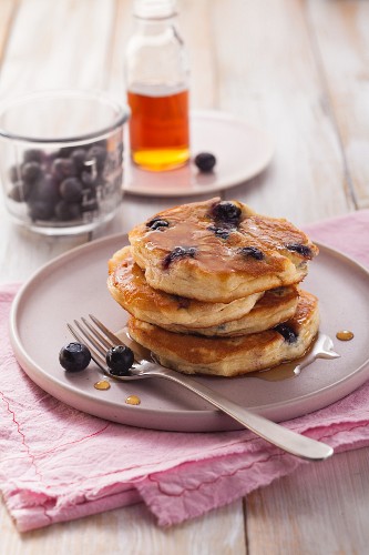 Blueberry pancakes with maple syrup