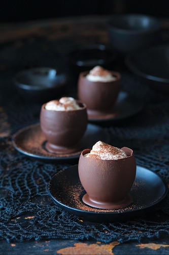 Chocolate bowls filled with cream