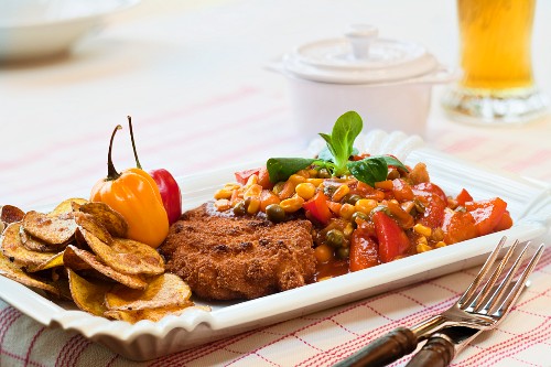 Veal schnitzel in a spicy pepper sauce