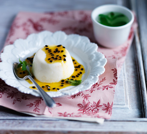 Panna cotta with passion fruit sauce and mint tea