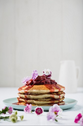 Buttermilk pancakes with strawberry compote and edible flowers