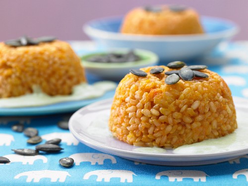 Rice and carrot domes on pea foam