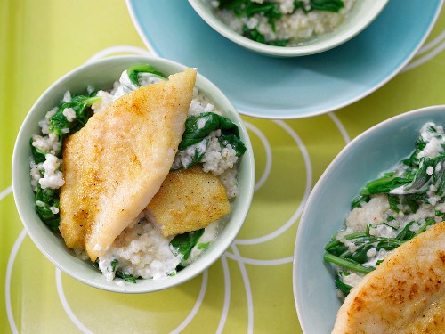 Pearl barley & spinach risotto with a fillet of fish seasoned with curry powder