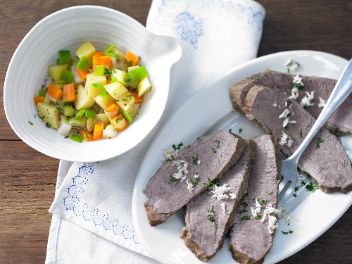 Boiled brisket of beef with potatoes cooked in vegetable stock and horseradish