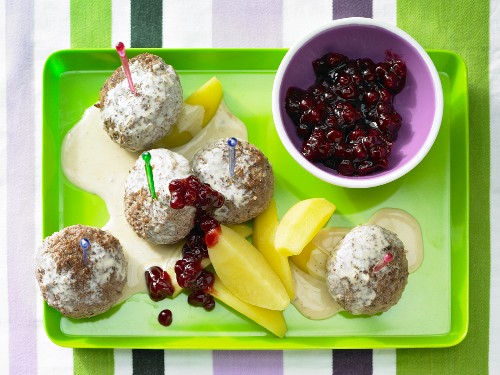 Köttbullar (Swedish meatballs) with potatoes and lingonberries