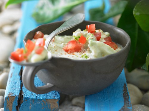 Avocado dip with diced tomato