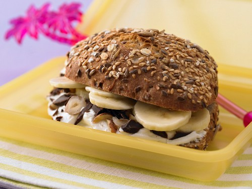 A banana roll with quark, chocolate and nuts