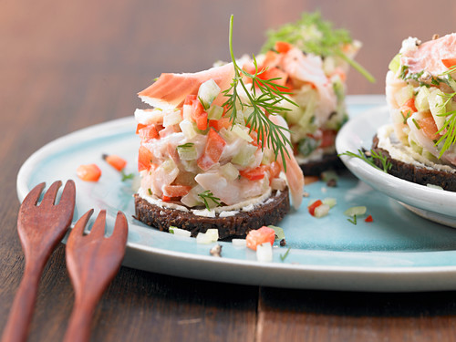 Trout tartare on Pumpernickel bread rounds