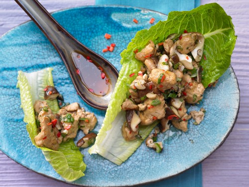 Asian chicken on a lettuce leaf