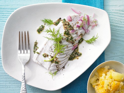 Steamed fillet of coalfish with herb sauce and swede purée