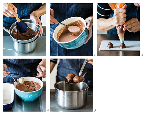 Chocolate doughnuts being made