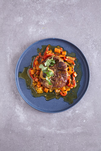 Kalbsbeinscheiben-Tajine mit Paprika und Harissa