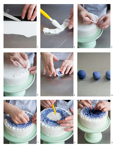 A blue-and-white ruffle cake being made