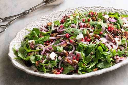 A healthy rocket, pomegranate and rice salad