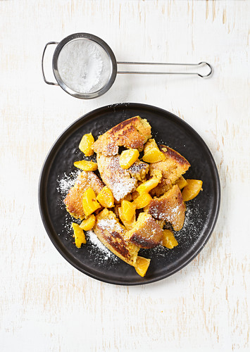 Shredded orange pancakes with almonds