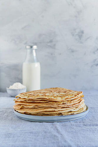 Vegan pancakes stacked on plates