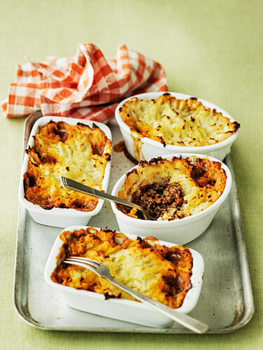 Individual shepherds pies on oven tray