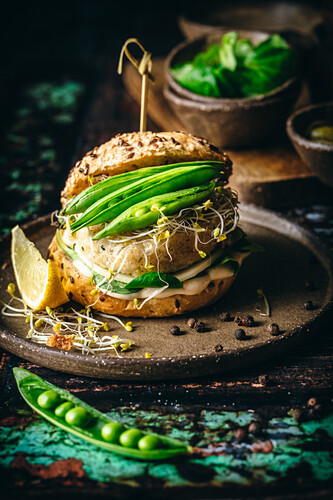 Vegetarian burger with peas and sprouts