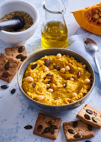 Pumpkin hummus and seed crackers