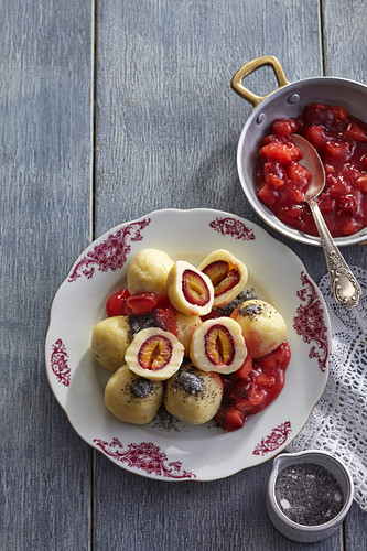 Potato dumplings with plums and broth