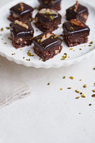 Pecan-walnut brownies with cocoa glaze