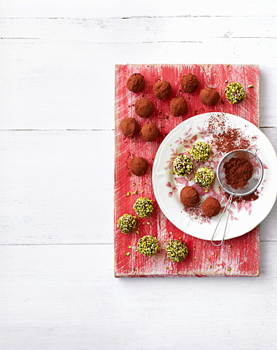 Chocolate truffles with cocoa powder and pistachios