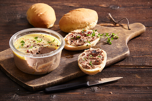 Homemade duck liver paté with small baguettes