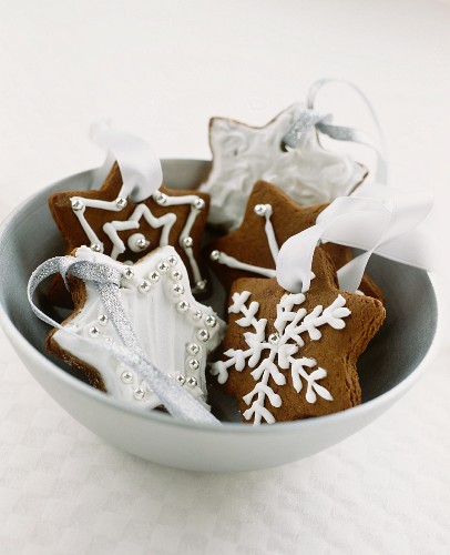Decorated chocolate biscuits as tree ornament
