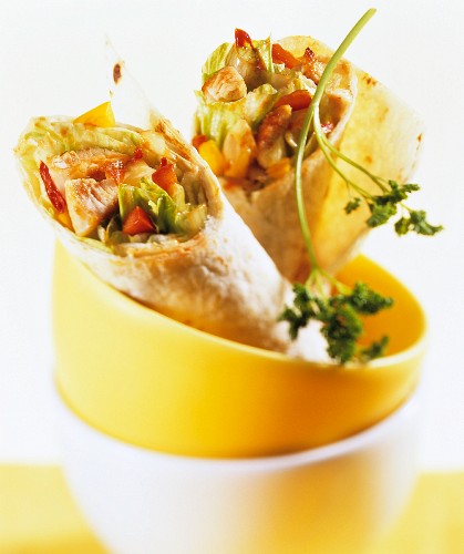Wraps with turkey breast and vegetable filling