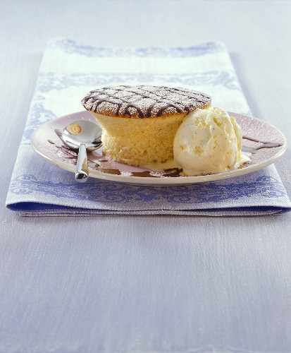 Marzipan and cherry souffle and a scoop of vanilla ice cream