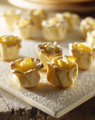 Pastry flowers with cheese cream filling and candied fruit