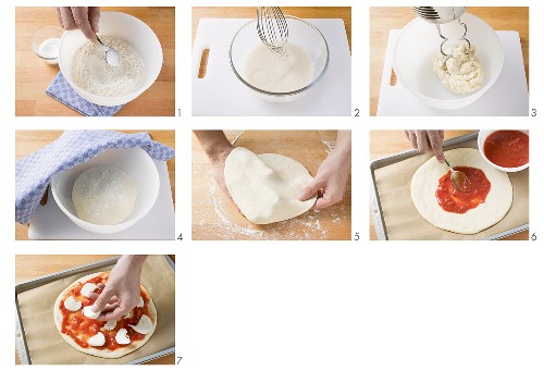 Making pizza topped with tomato sauce and mozzarella