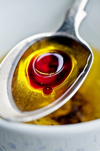 Vinaigrette in spoon (close-up)