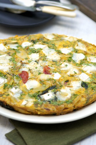 Potato and spinach tortilla with goat's cheese