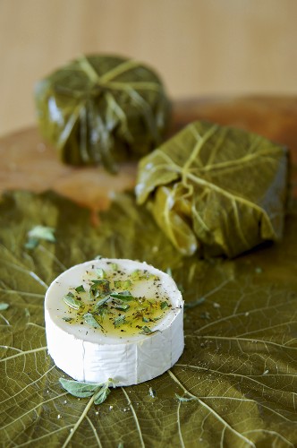 Wrapping goat's cheese in vine leaves