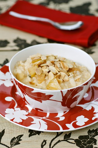 Rice pudding with apple, mascarpone and flaked almonds