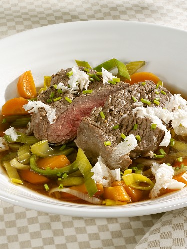 Boiled beef fillet with vegetables and horseradish