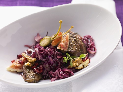 Red cabbage salad with fried duck liver and figs