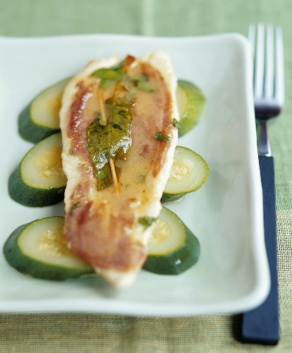 Chicken saltimbocca on courgette slices