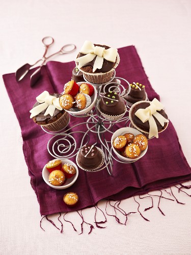 Assorted muffins on a wire stand