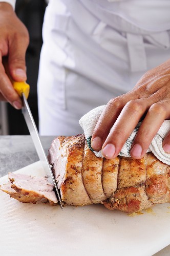 Pork roulade being sliced