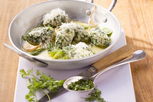 Spinach and quark gnocci with garlic and chervil butter